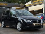 Volkswagen Touran United 7-Sitzer Radio Klima Xenon TÜV - Volkswagen Touran aus 2009: United