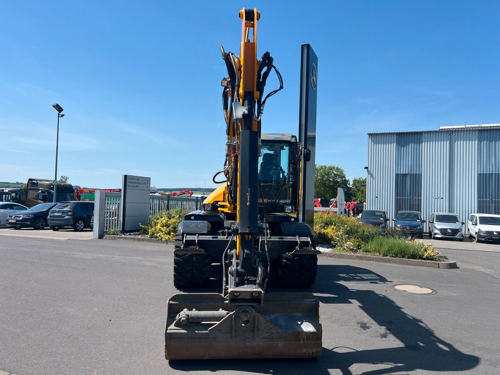 Fahrzeugabbildung JCB Hydradig 110W / Pratzen / nur 179h / Löffelpaket