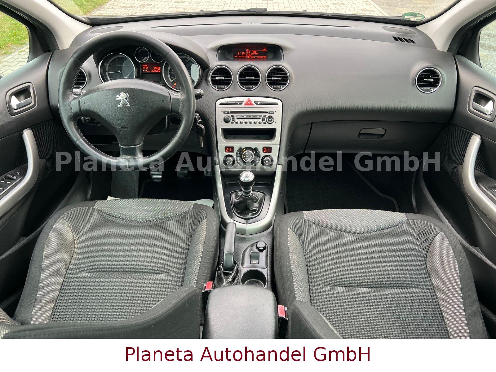 Peugeot 308 2011 — photo 16