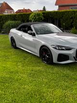 BMW M440 i xd Cabrio incl. WR auf Felge - graue BMW 440