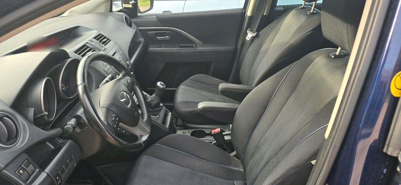 Mazda 2 2011 — photo 7