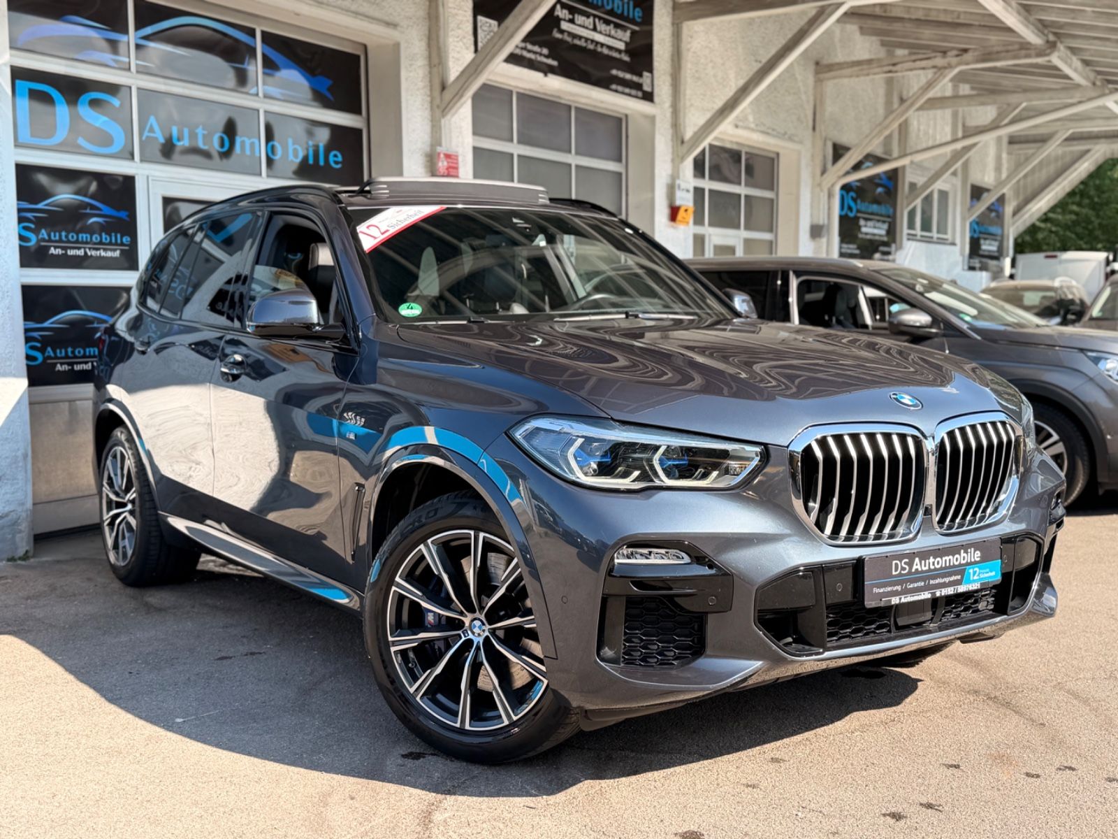 BMW X5 xDrive 30d M Sport Laser Pano HUD H&K Sthzg foto 6