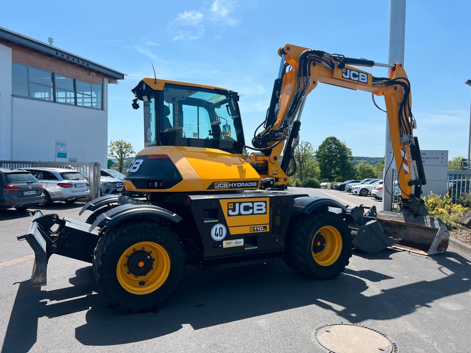 Fahrzeugabbildung JCB Hydradig 110W / Pratzen / nur 179h / Löffelpaket