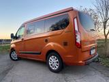 Ford Transit Custom Westfalia - autark durch Solar - orange Wohnmobil oder -wagen