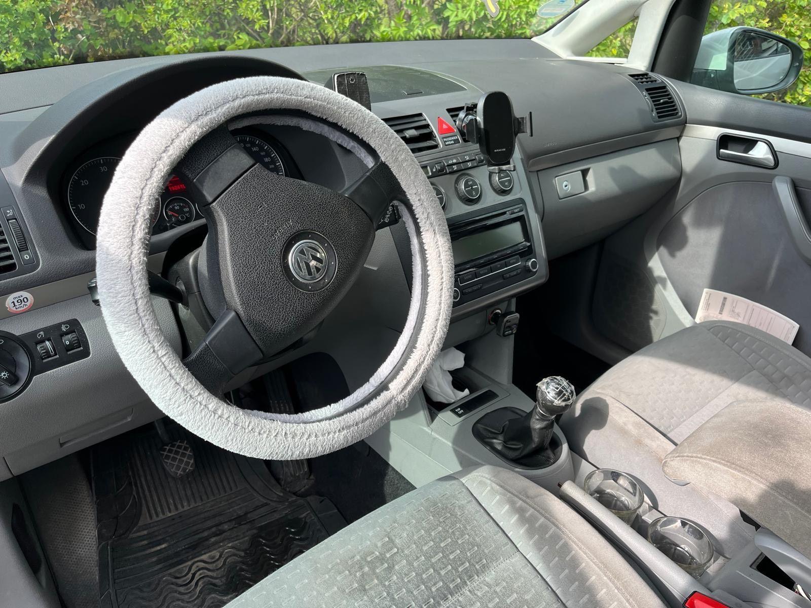 Volkswagen Touran 2009 — engine 140 HP (103kW)