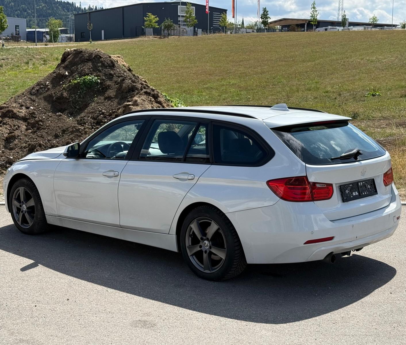 BMW 320 2013 — rear view