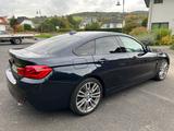 BMW 440i xDrive Gran Coupé M Sportpaket - mit Benzin-Antrieb: Coupe, Schwarz, Sportpaket