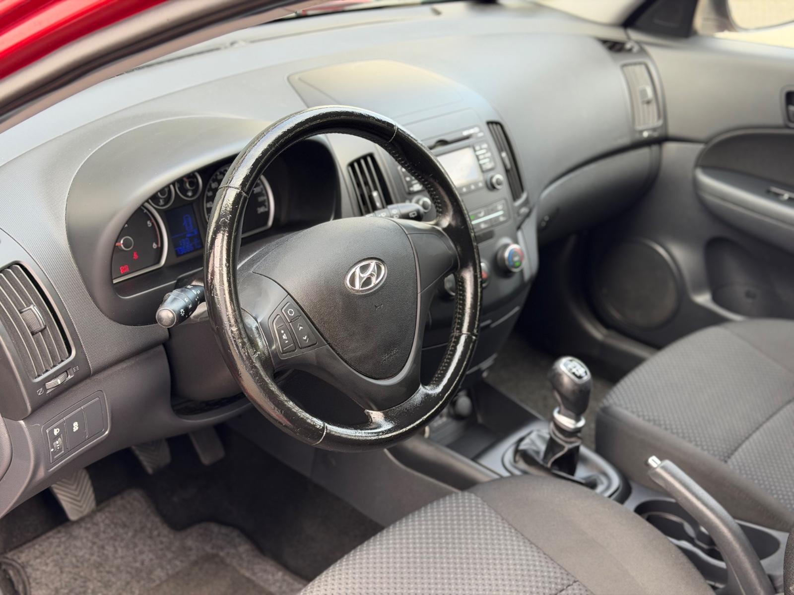 Hyundai i30 2011 — photo 11