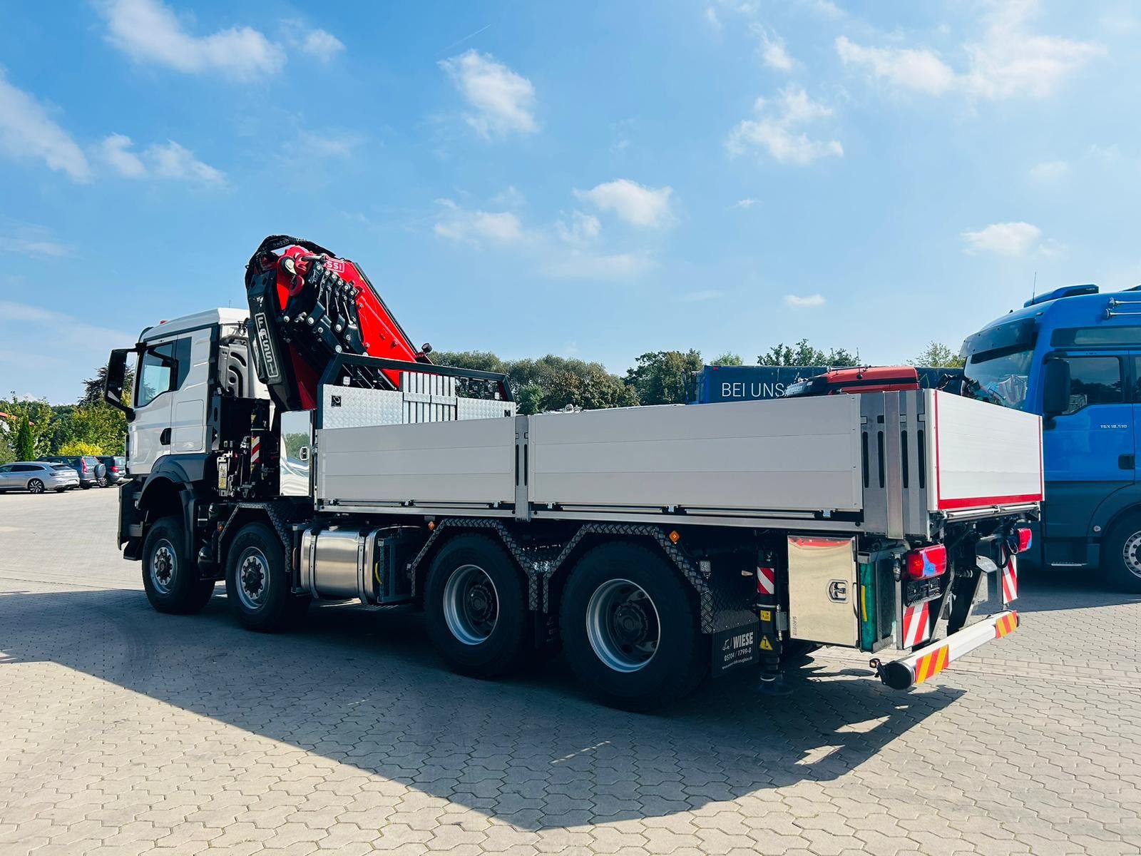 Fahrzeugabbildung MAN TGS 41.520 8x8 mit Fassi Ladekran F710RA.2.26
