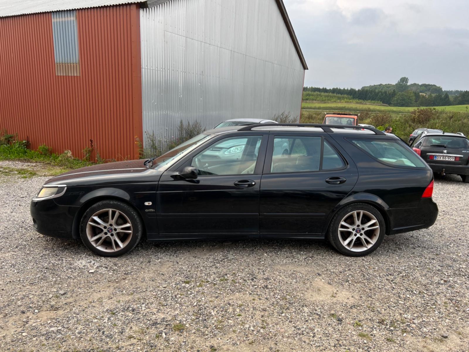 Saab 9-5 2009 — вигляд ззаду