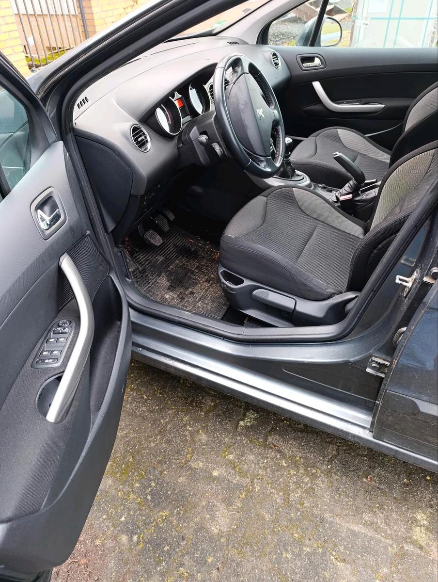Peugeot 308 2011 — photo 8