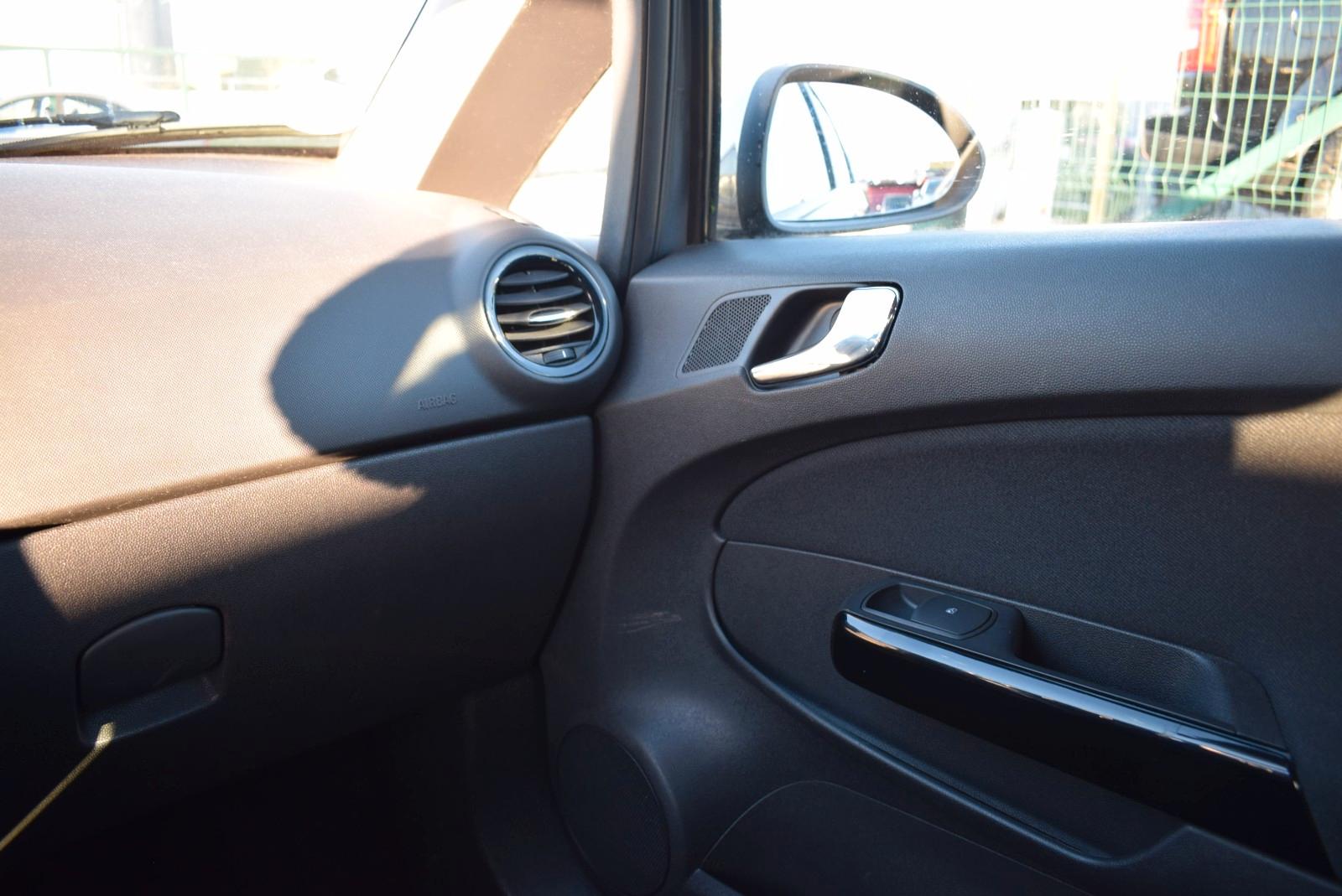 Opel Corsa 2013 — photo 15
