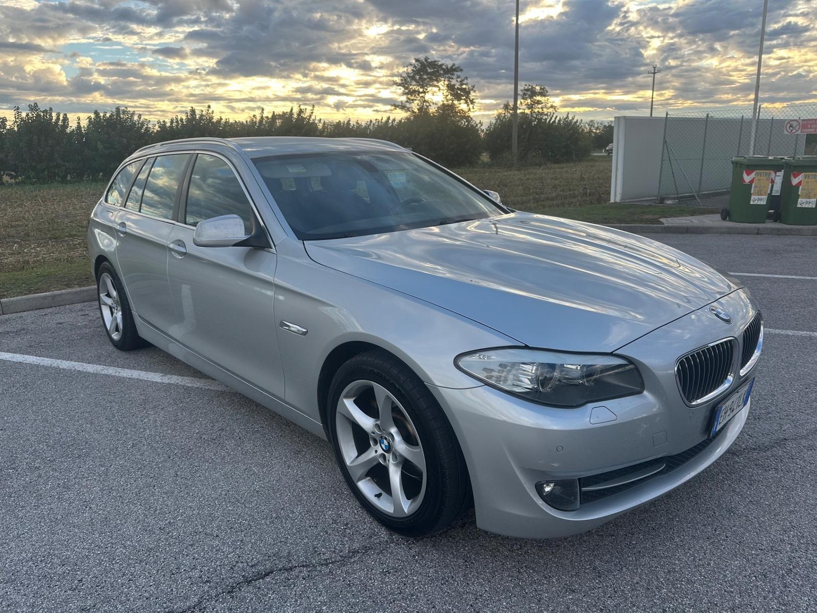 BMW 520 2011 — rear view