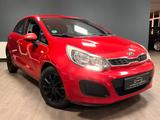Kia Rio 1.2 Edition 7 / 1.HAND / KLIMA / SIGNAL RED - gebrauchte Kia Rio aus dem Jahr 2013