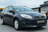 Ford Focus Turnier 1.6 TDCi*SITZH*NAVI*AHK*ZAHNR.-NEU - Ford Focus mit Diesel-Antrieb: Kombi, 1.6