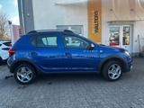 Dacia Sandero II Stepway  = Automatik - Ahk - Kamera = - Dacia Sandero in Lübeck