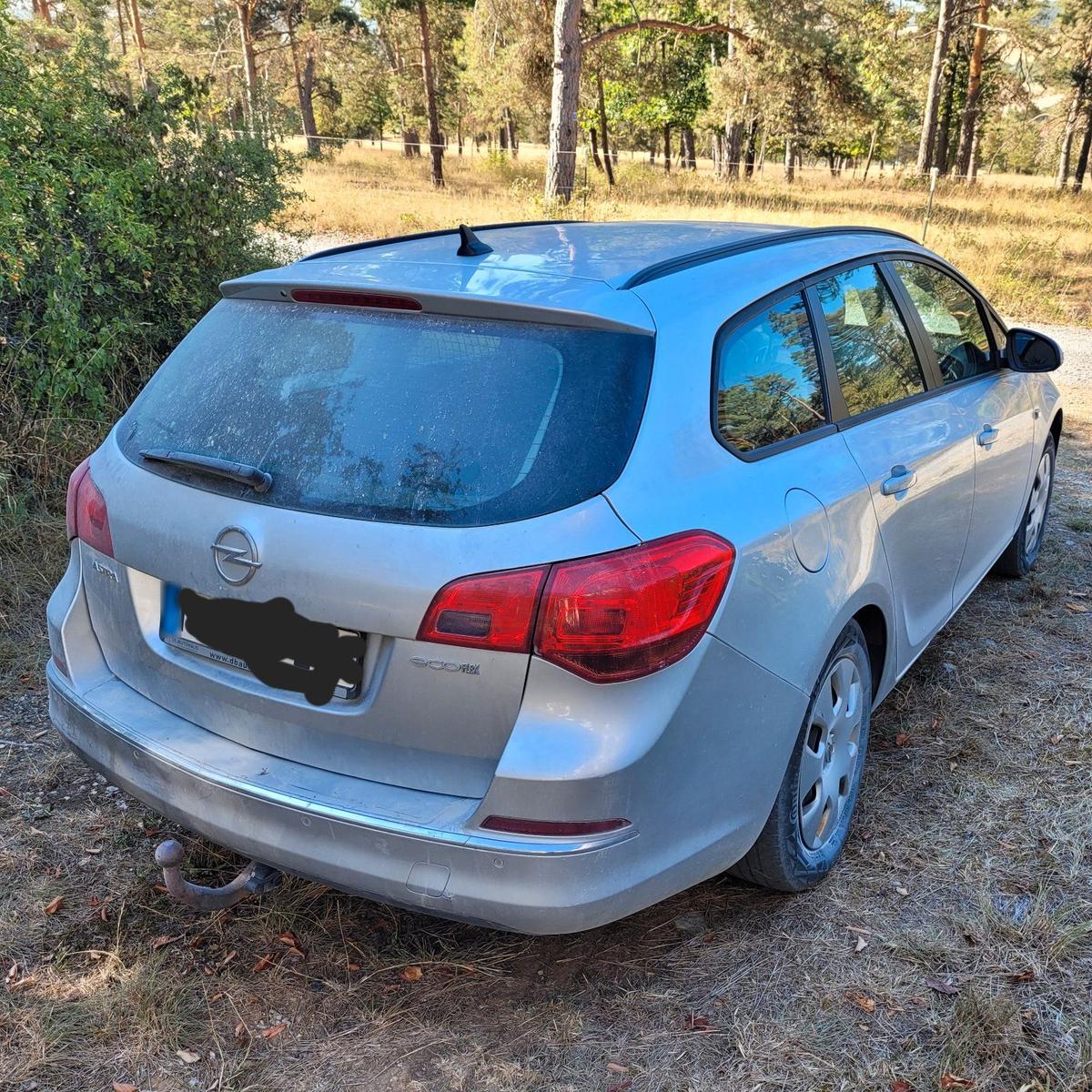 Opel Astra 2014 — engine 110 HP (81kW)