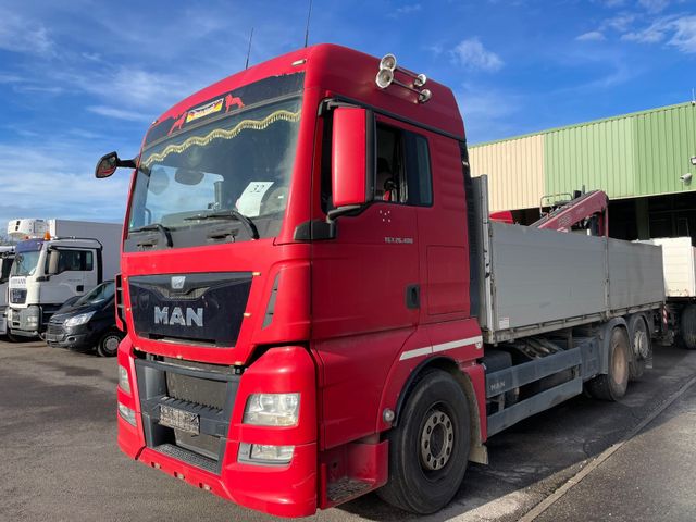 MAN TGX    26.480    / Fassi  F 215 AS  / Baustof