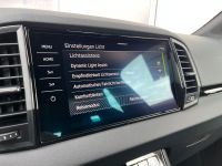 Skoda Karoq 1.5 TSI DSG Sportline PANO KAM AHK 4JGAR bei Autohaus Landmann & Maier OHG