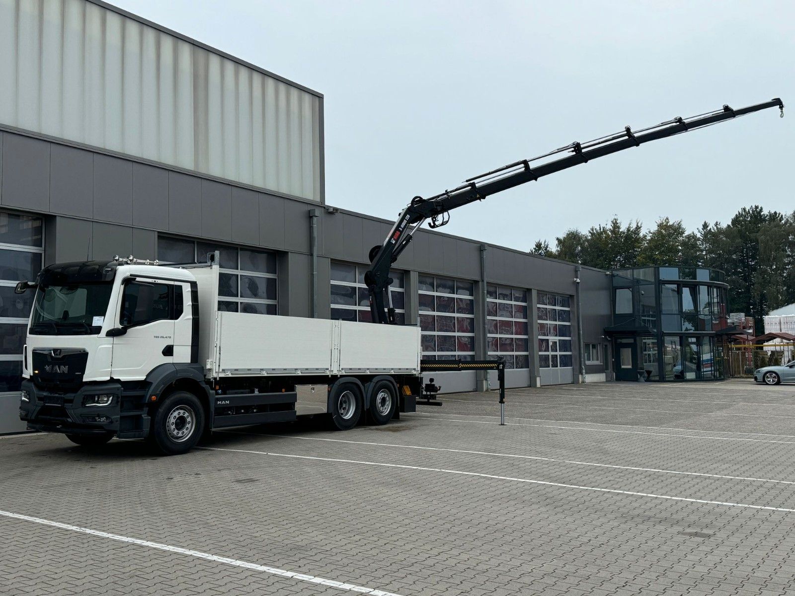 Fahrzeugabbildung MAN TGS 26.480 6x2-4 Pritsche HIAB 228-6 Funk  ACC