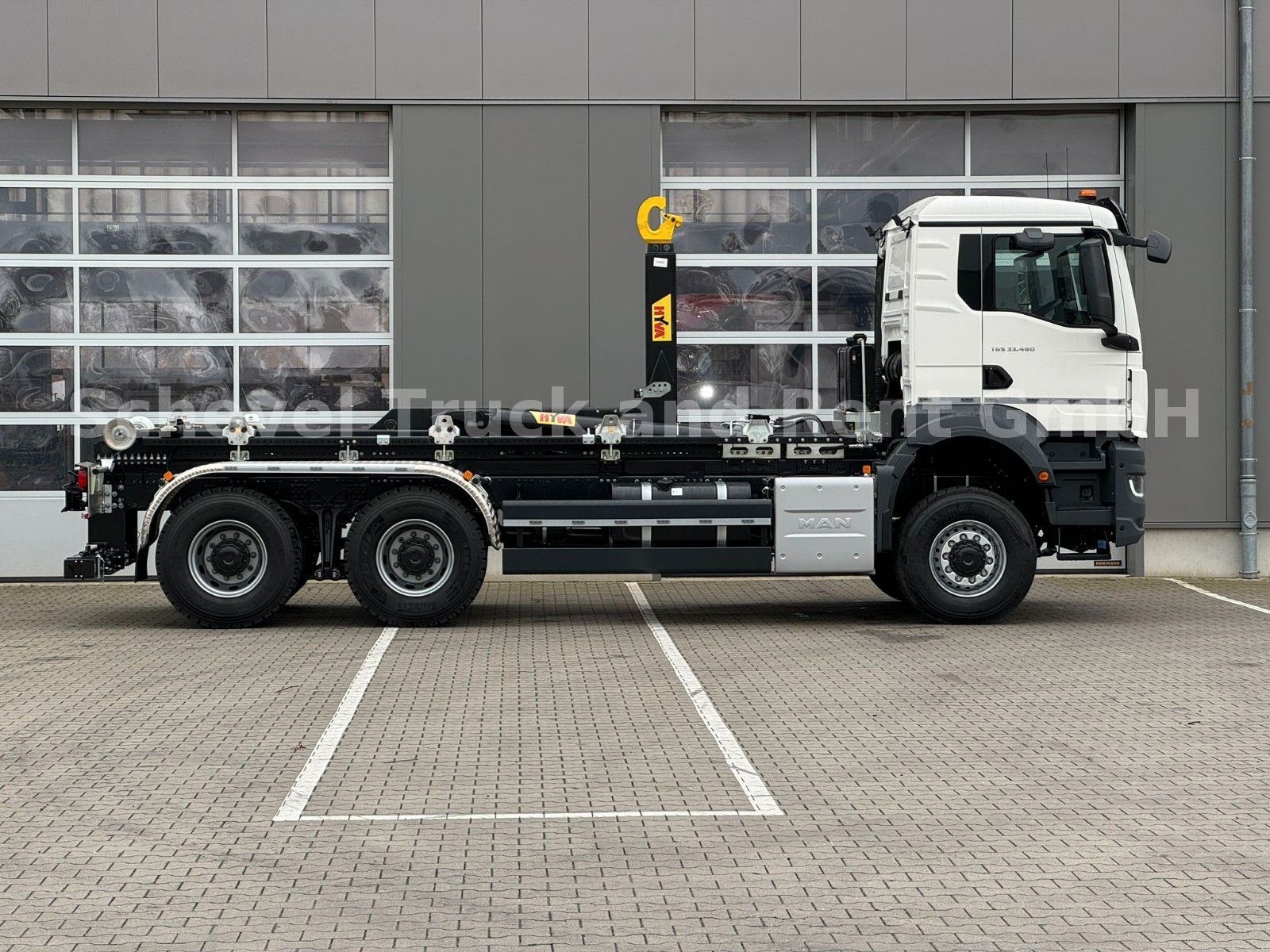 Fahrzeugabbildung MAN TGS 33.480 Abrollkipper HYVA  / 26-55s 6x6/60Ton
