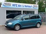 Volkswagen Touran 1.6 FSI 7 Sitze Automatik - Volkswagen Touran mit Benzin-Antrieb: Kleinbus, Automatik, 1.6