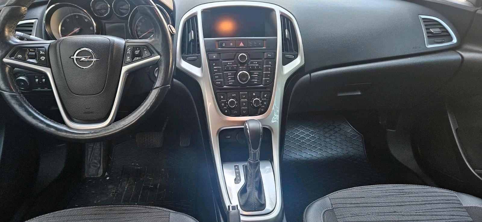 Opel Astra 2014 — photo 13