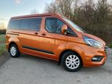 Ford Transit Custom Westfalia - autark durch Solar - orange Wohnmobil oder -wagen