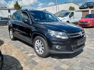Volkswagen Tiguan - 1
