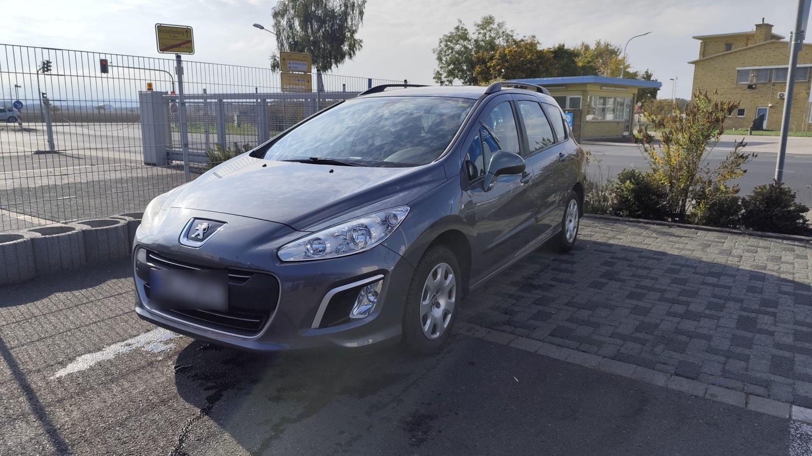 Peugeot 308 2011 — photo 12