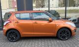 Suzuki Swift Comfort / Sitzheizung /  Tempomat - Suzuki Swift mit Benzin-Antrieb: Orange