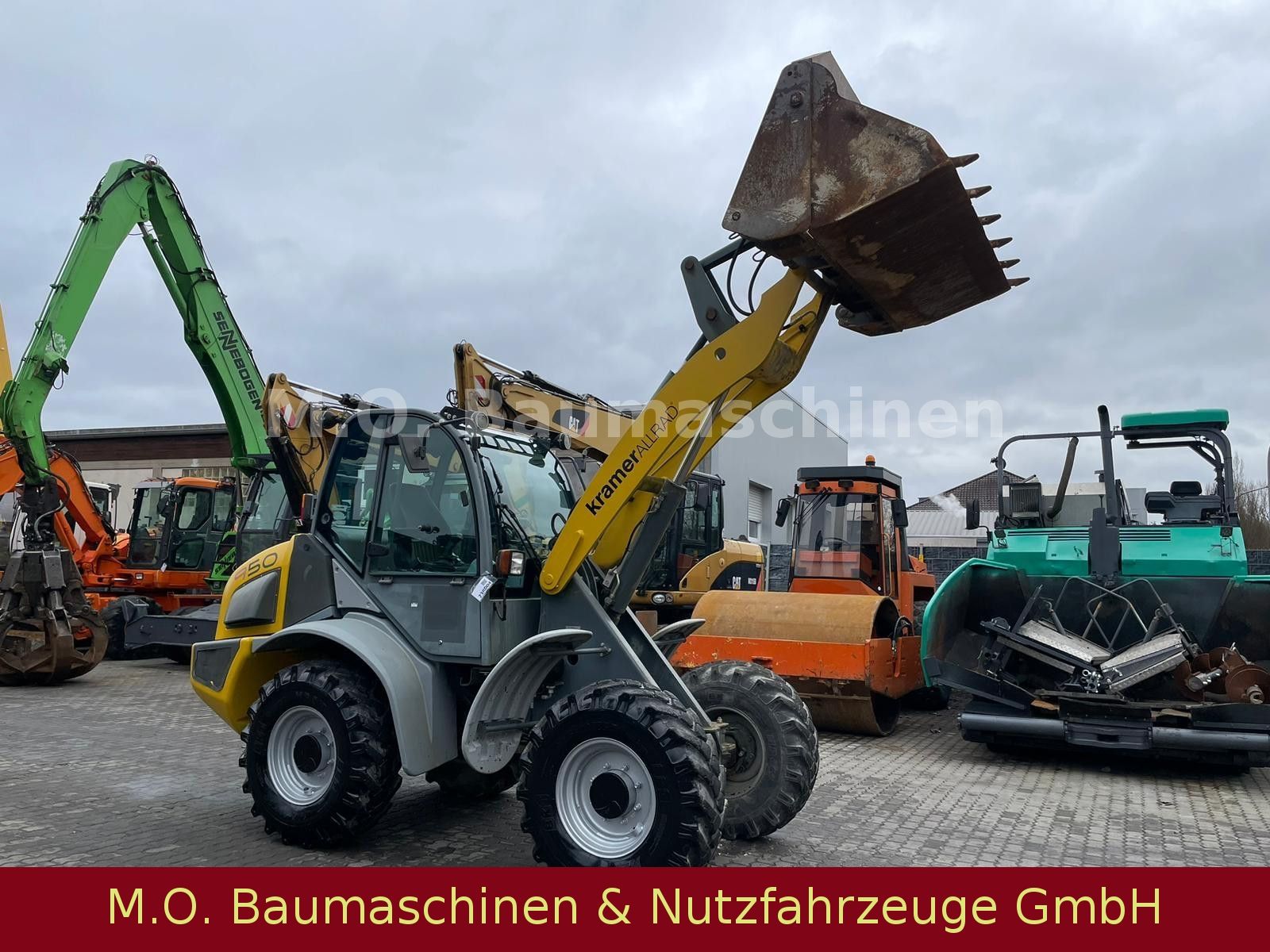 Fahrzeugabbildung Kramer 950 / 347-03 / SW / Klappschaufel /Allrad