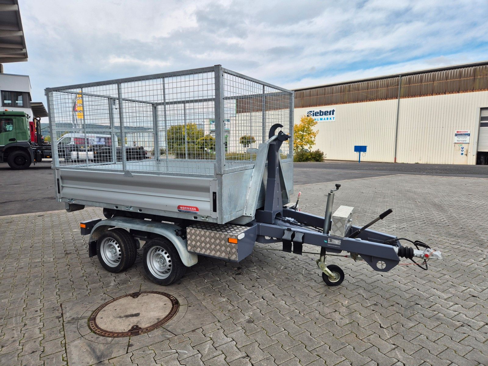 Fahrzeugabbildung Wörmann Abrollkipper Mulde Gitterbox