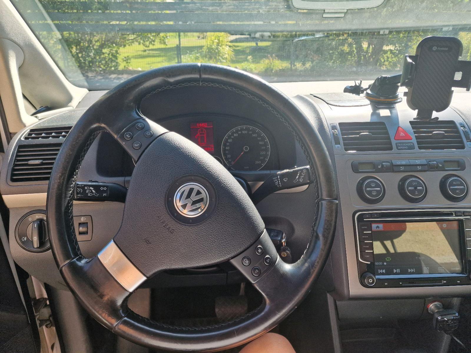 Volkswagen Touran 2009 — photo 12