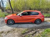 BMW M135i - - BMW: Orange