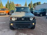 Suzuki Jimny Comfort+ AllGrip/Navi/Shz/4Sitzer - Suzuki Gebrauchtwagen in Mannheim