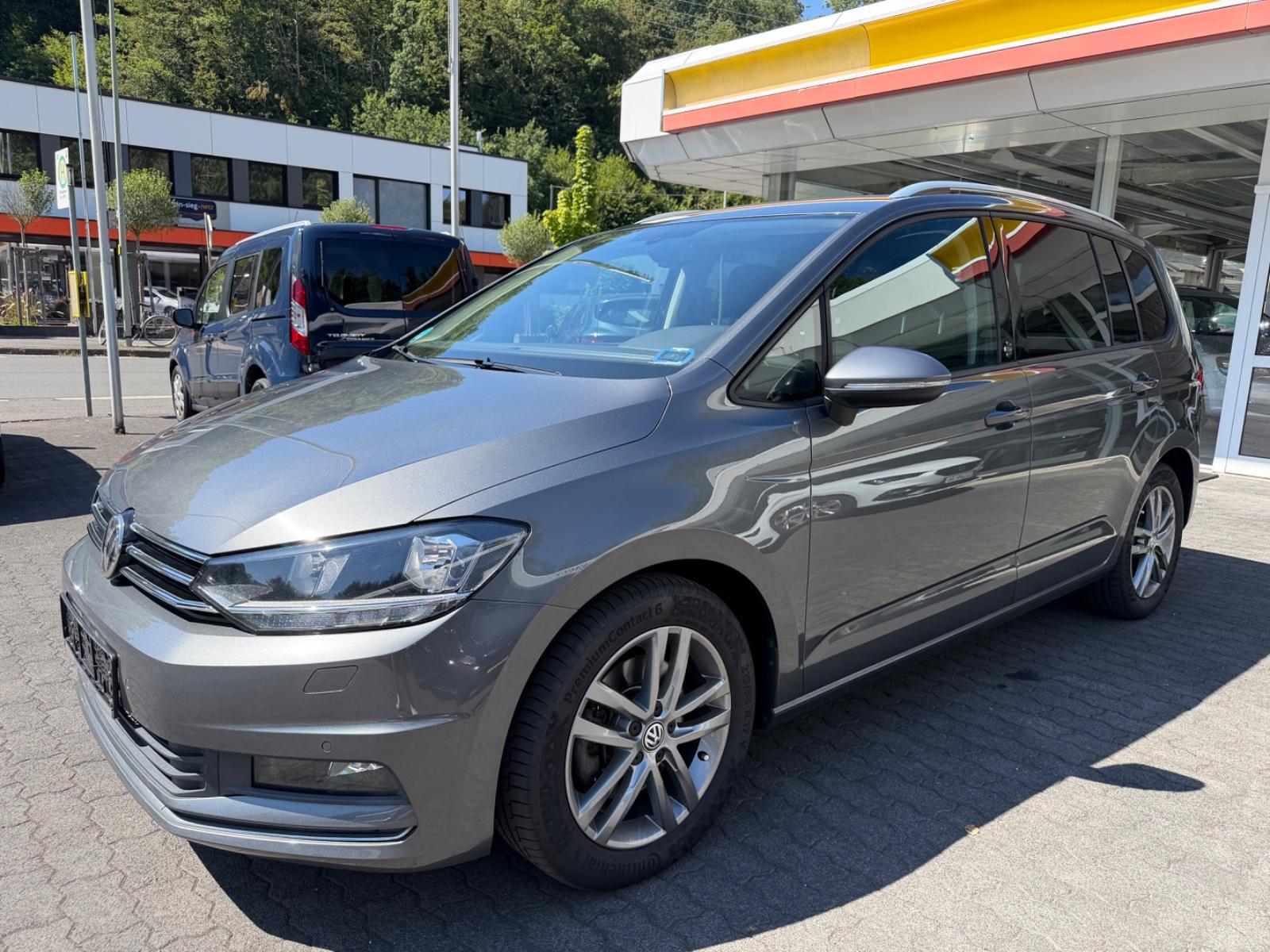 Volkswagen Touran Sound*7 Sitzer*schw. AHK*2- KLIMATRONIC