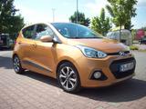 Hyundai i10 1.0/67 PS  Mandarin-Orange Rentnerfahrzeug - Hyundai i10 mit Benzin-Antrieb: Gold