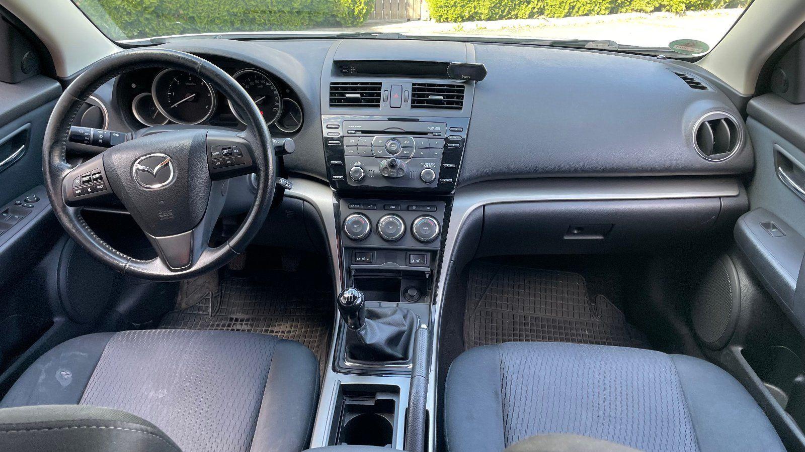 Mazda 2 2011 — photo 9