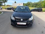 Suzuki SX4 Limited*1.Hand*Klima*Wenig KM! - schwarze Suzuki SX4