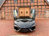 Lamborghini Revuelto V12 MY26/Carbon/PassengerDis/CorsaTex - schwarze Lamborghini Revuelto