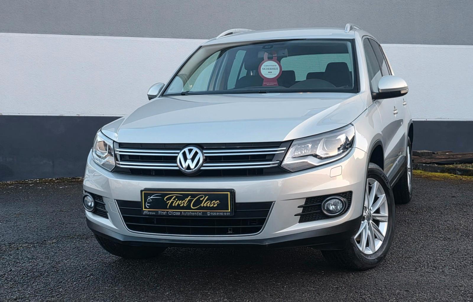 Volkswagen Tiguan 1.4 TSI Sport & Style 1.Hand,8Fach,Navi