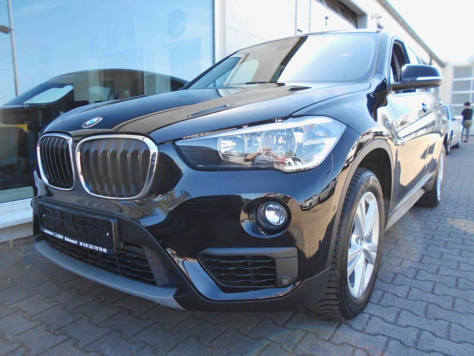 BMW X1 18i -NAVI-SPORTSITZE-PDC-TEMPOMAT-MFL-AHK-...