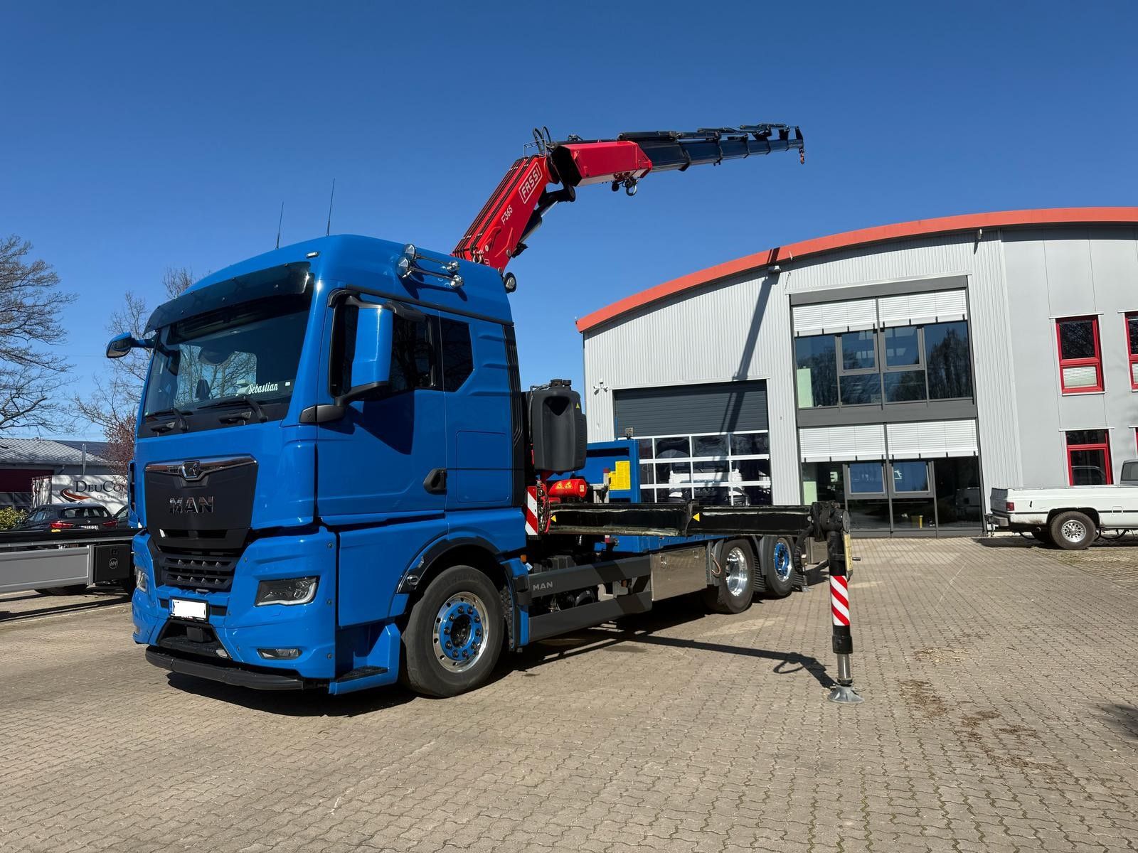 Fahrzeugabbildung MAN TGX 26.640 mit Fassi F365A2.26 Containerpritsche