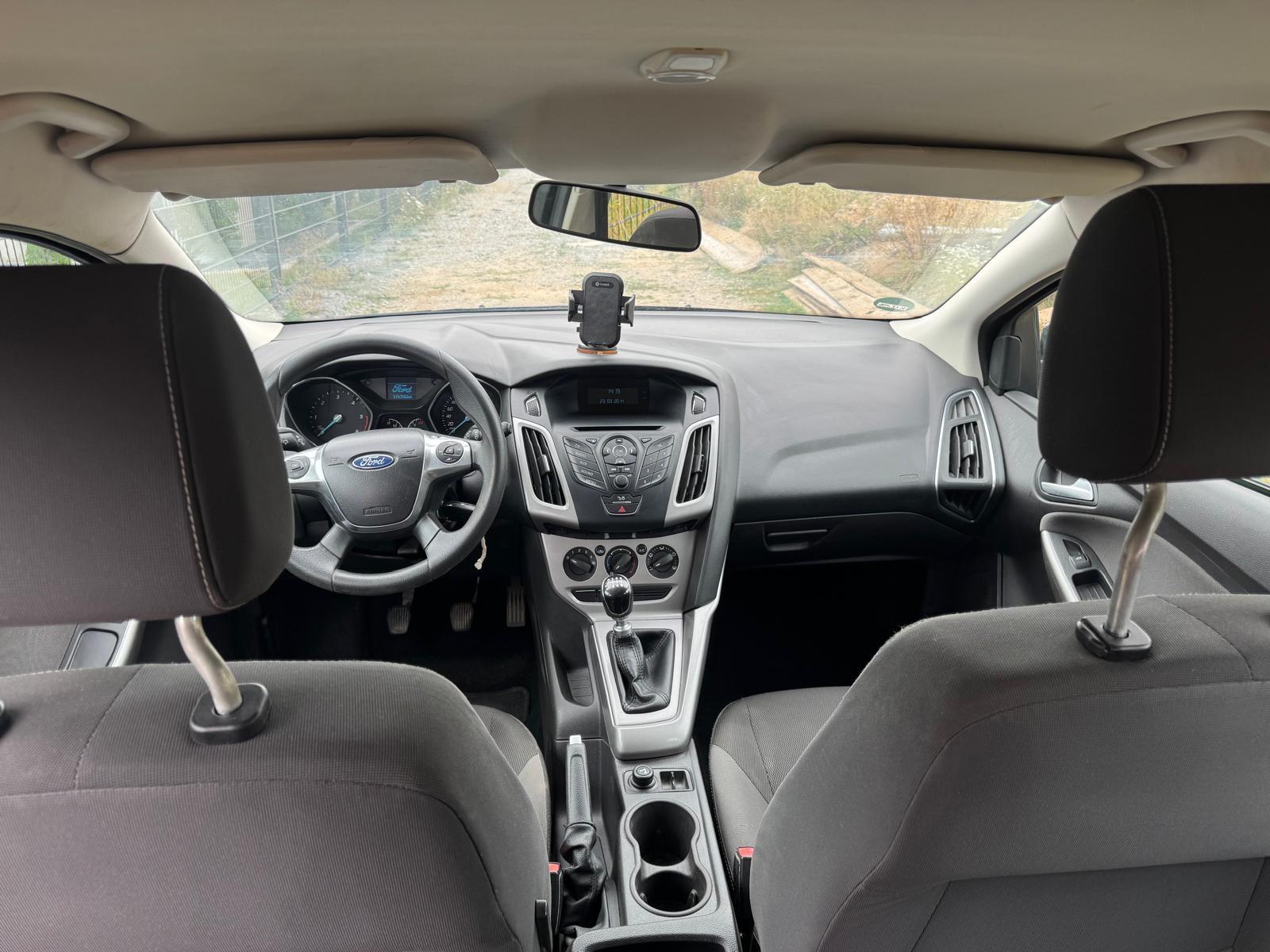 Ford Focus 2013 — engine 1.560 cm³, 116 HP (85kW)