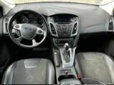 Ford Focus 2014 — фото 11