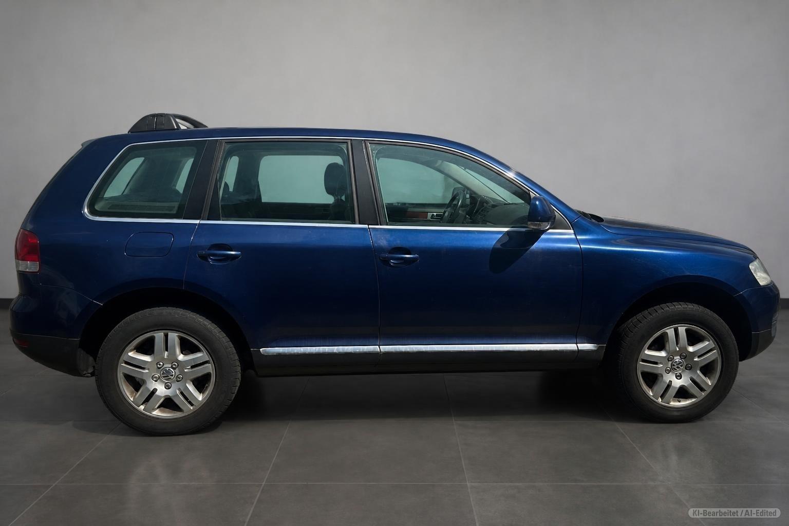 Volkswagen Touareg 2004 — photo 8