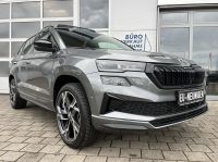 SKODA Karoq Sportline 2.0 TDI DSG 4x4 PANO AHK 5J GAR bei Autohaus Landmann & Maier OHG