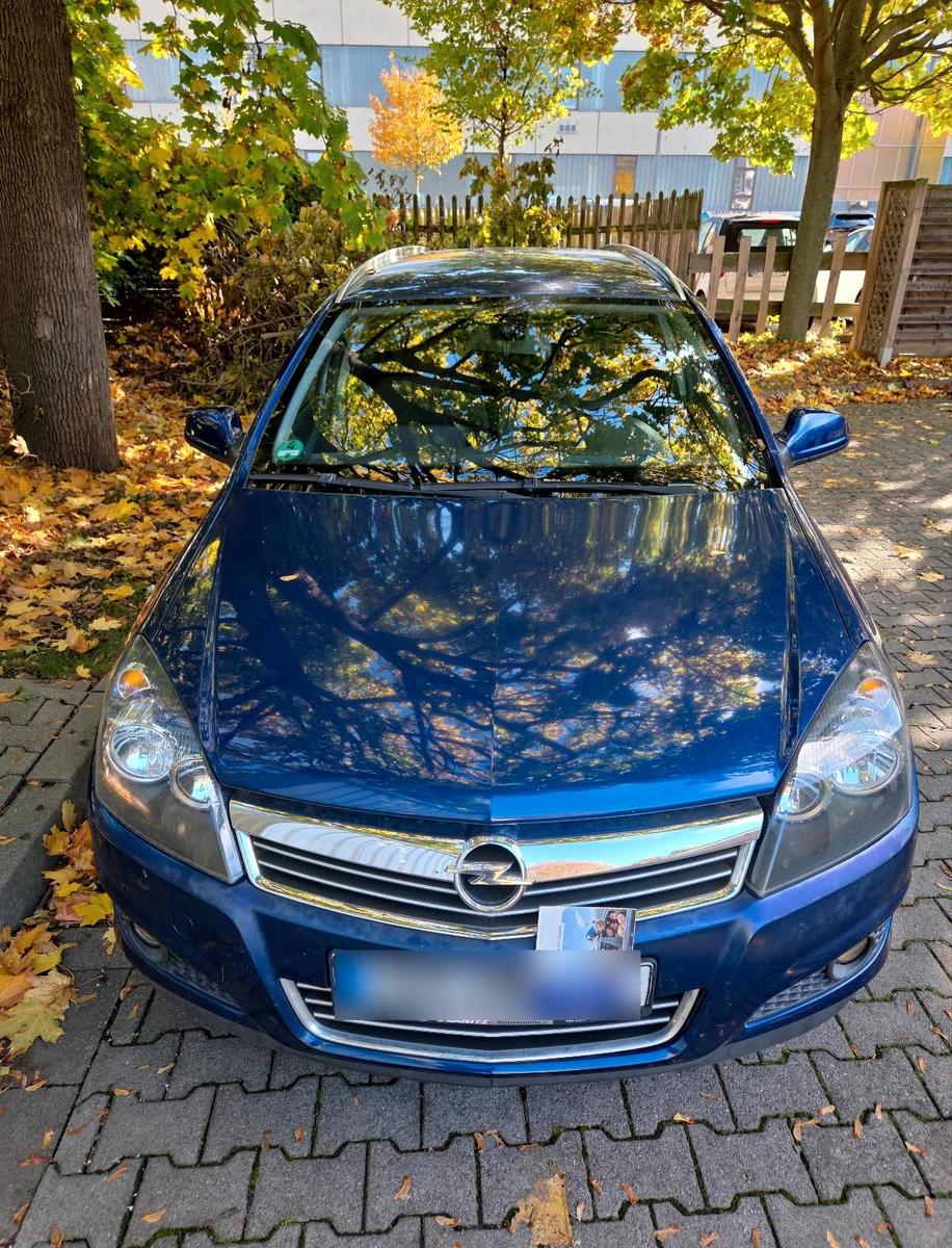 Opel Astra 2010 — engine 116 HP (85kW)