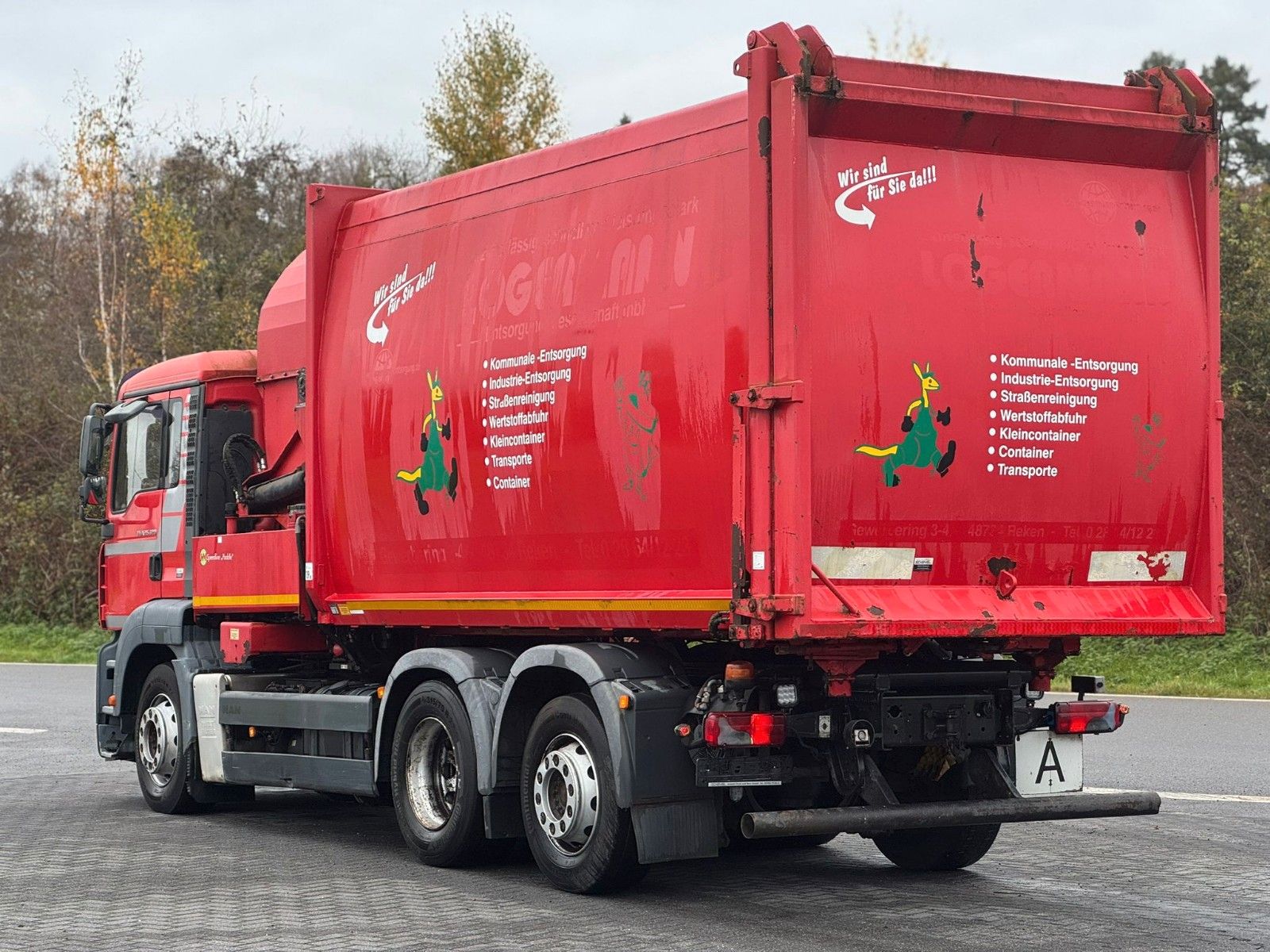Fahrzeugabbildung MAN TGA 26.320 B/L  6x2 Faun Seitenlader Müllwagen